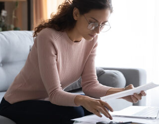 Woman Planning Her Budgets Featured Image