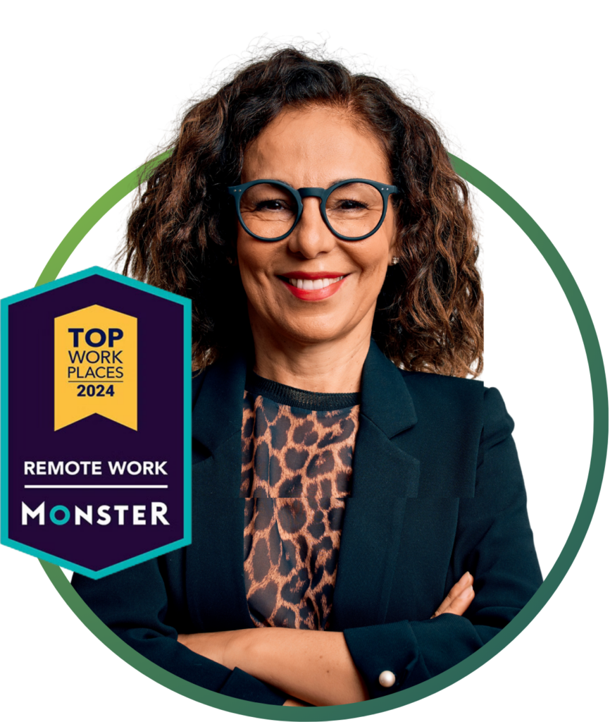 A person with glasses crossing their arms. With a logo of Top place to work logo.