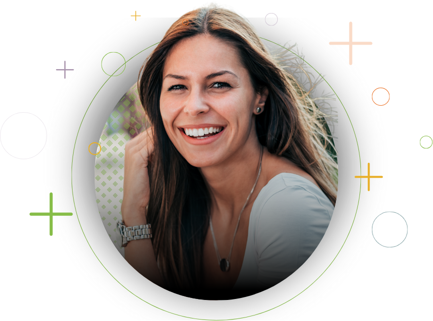 a brown hair woman smiling into the camera