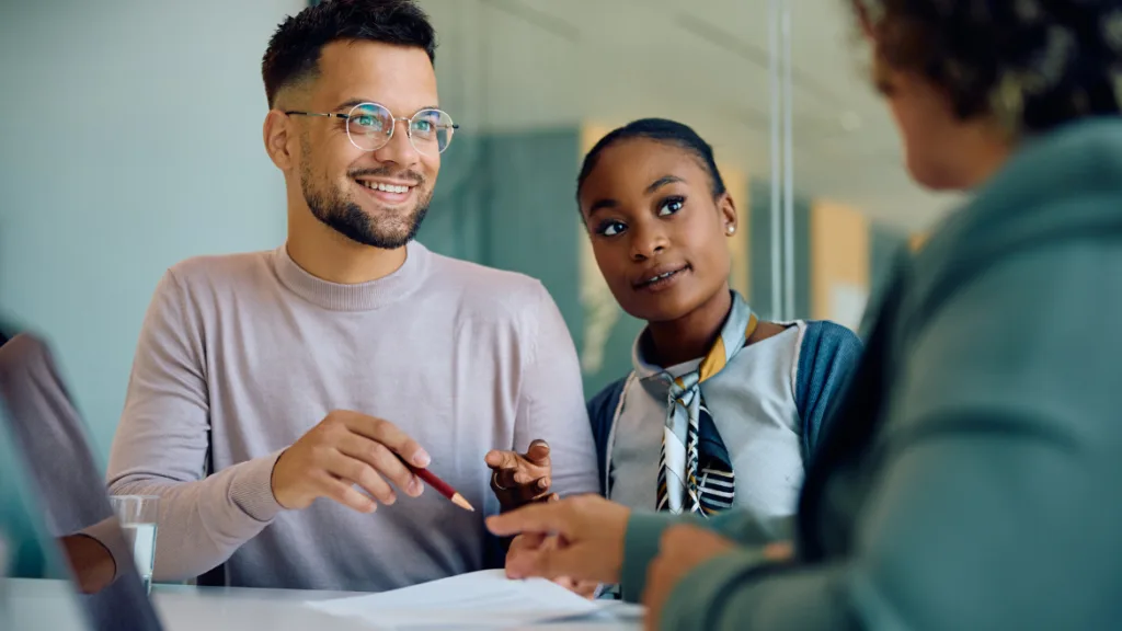 A couple having a counseling session with a financial expert.