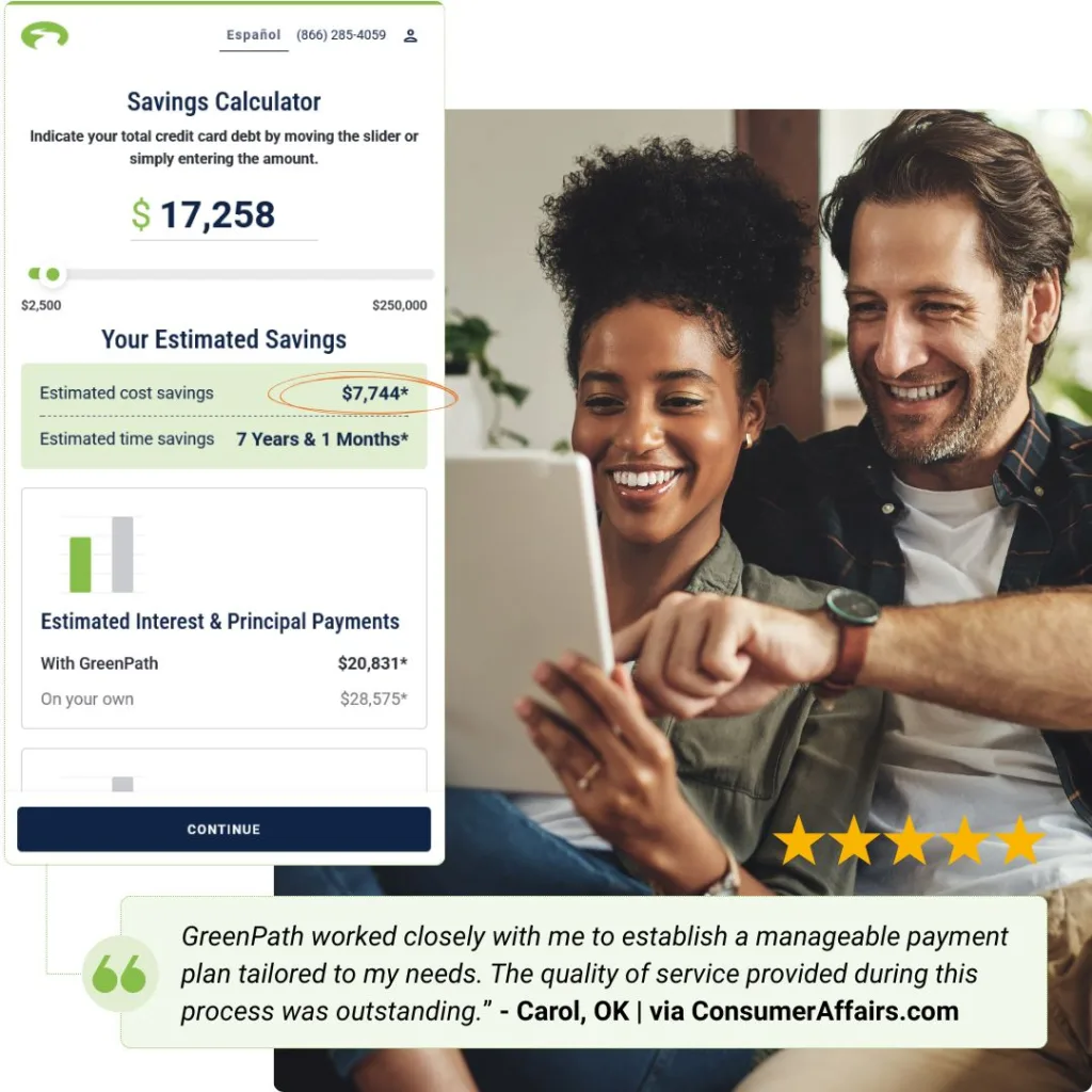 Couple looking at a debt management program on their tablet.
